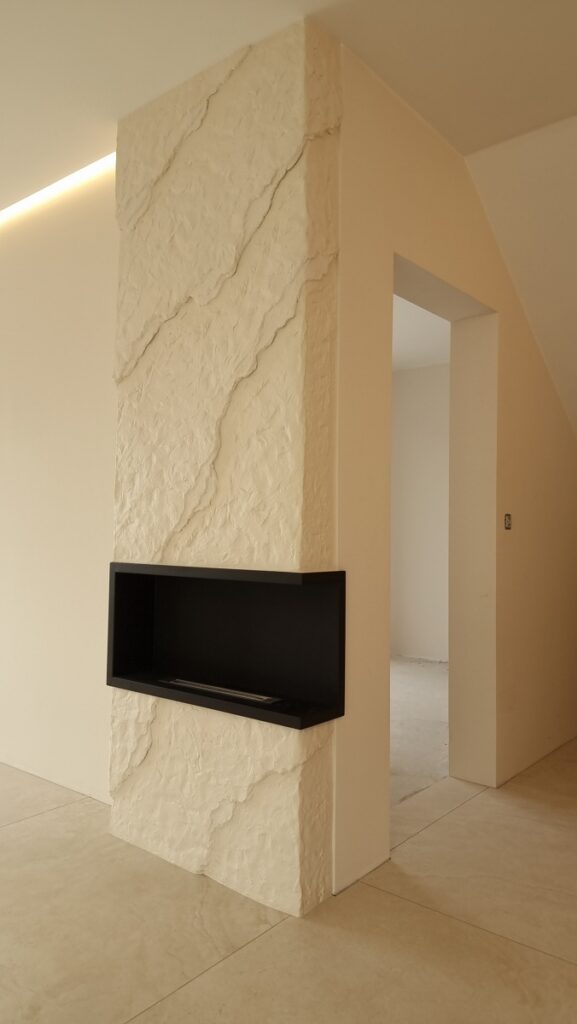 3D Töredezett pala sziklafal kandalló mögött – kézzel formált sziklafal bézs színben